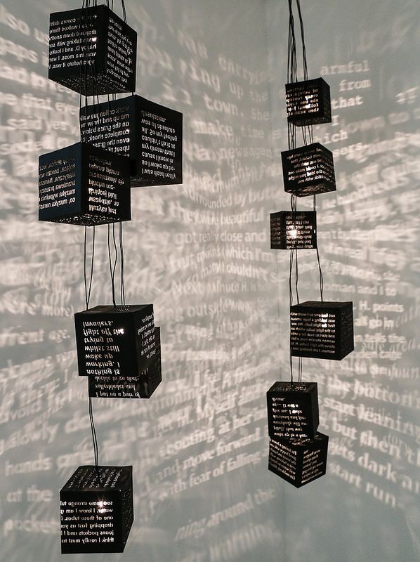 Suspended text cubes with projected words